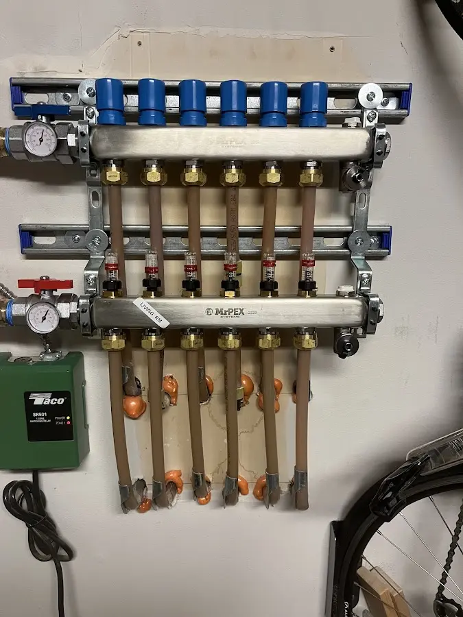 Plumber performing Leak Detection at a residential property in North Brookfield